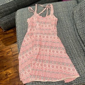 Pink patterned fitted dress with slight A line